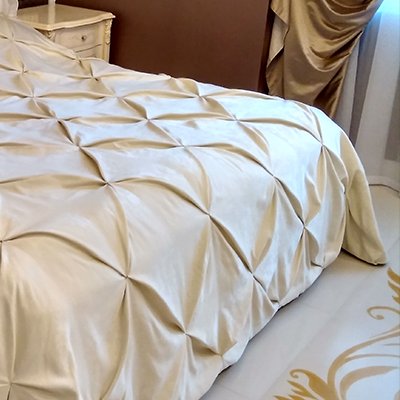 Покрывала и подушки